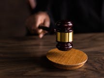Brown Wooden Gavel on Brown Wooden Table